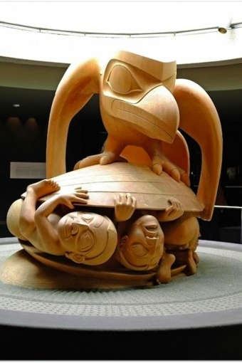 Bill Reid carving of Raven with Clamshell of Humans